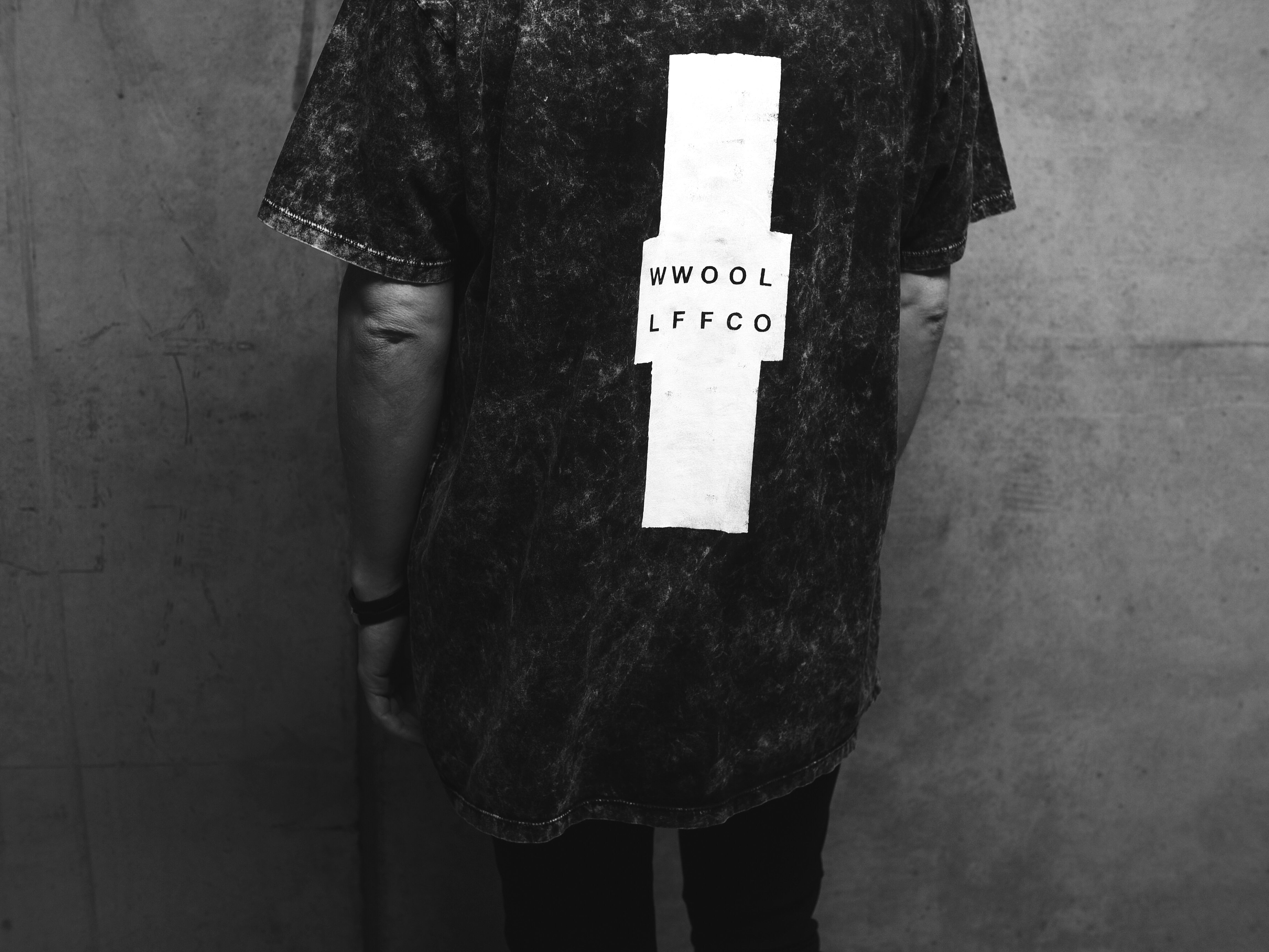 WWOOLLFF Cross | Oversized Acid Washed Black Tee